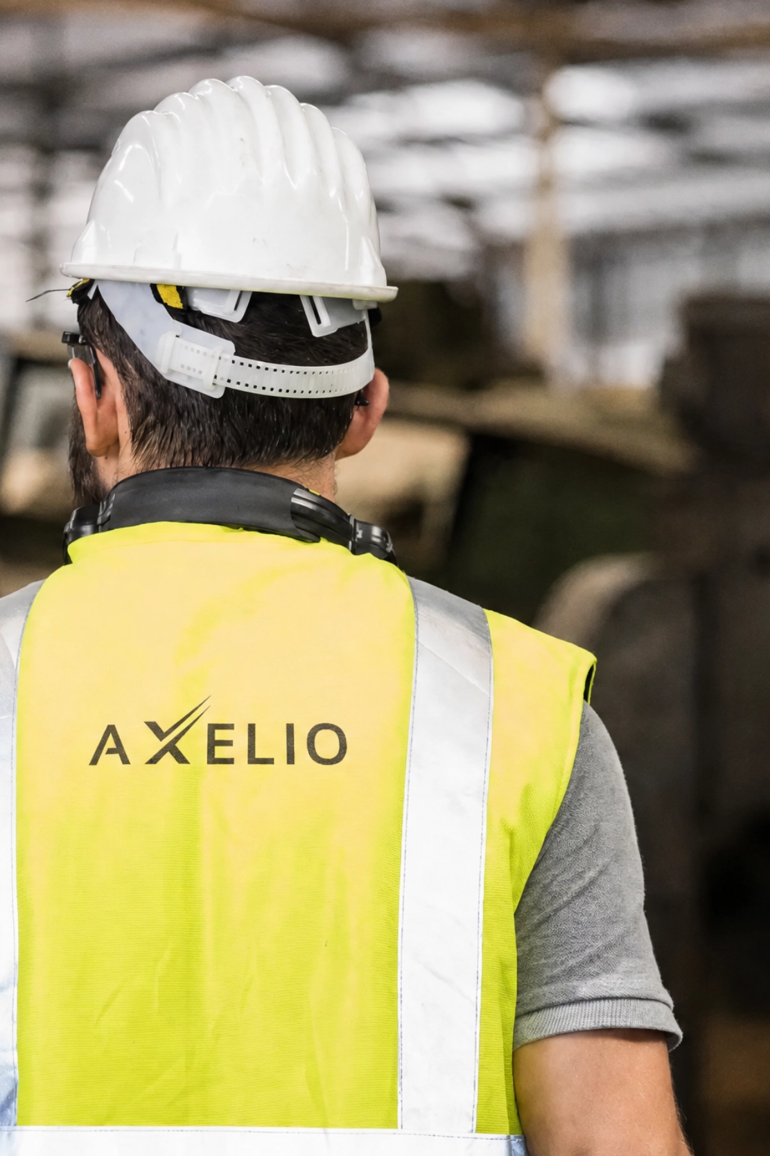 Arbeitskleidung und Markenauftritt für den Industriebetrieb Axelio – Projektreferenz der Unternehmensberatung für den Mittelstand TENOR